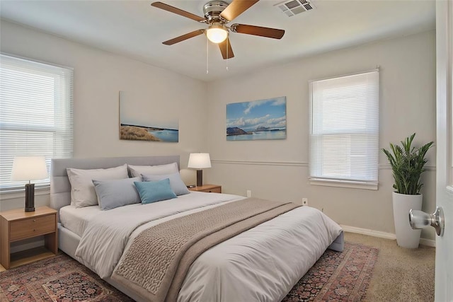 carpeted bedroom featuring ceiling fan