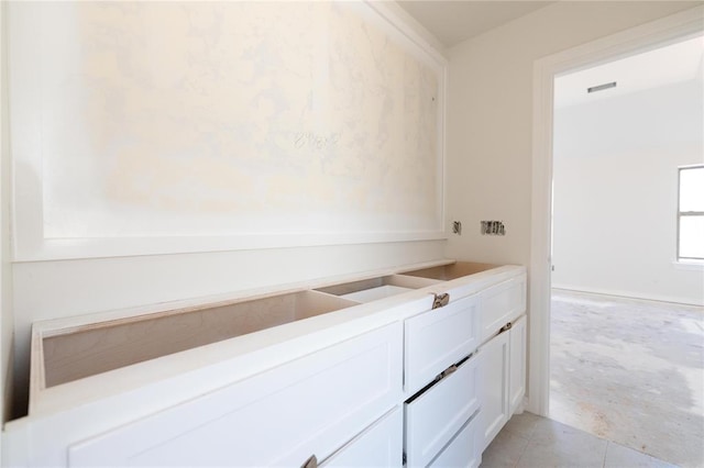 bathroom featuring tile patterned flooring