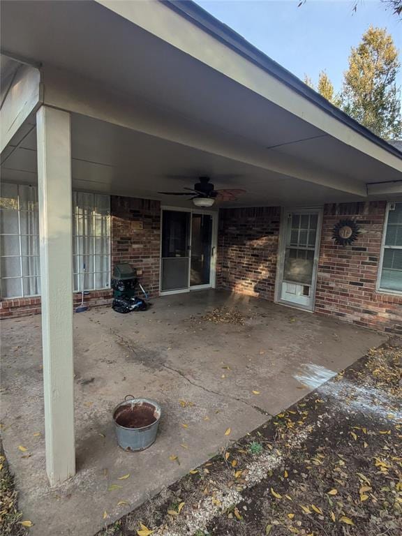 view of patio featuring ceiling fan