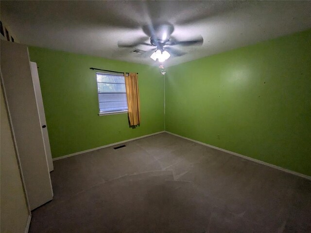 spare room featuring carpet floors