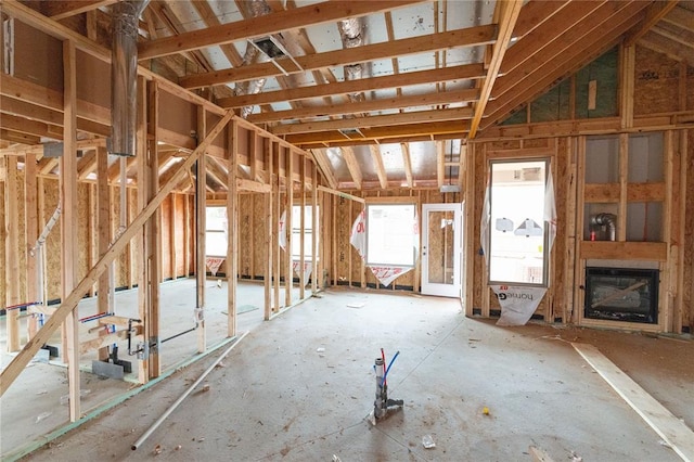 misc room featuring lofted ceiling