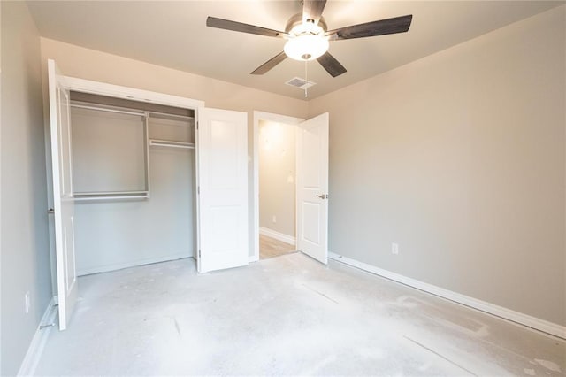 unfurnished bedroom with ceiling fan, baseboards, visible vents, unfinished concrete flooring, and a closet