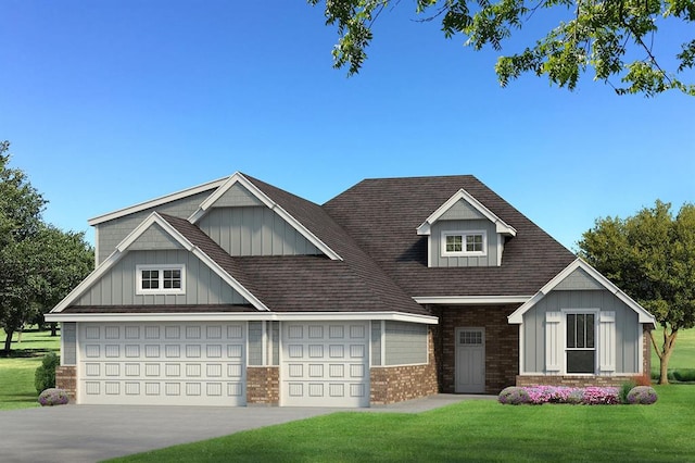 craftsman house featuring a garage and a front lawn