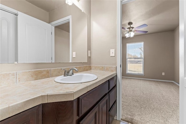 bathroom featuring vanity and ceiling fan