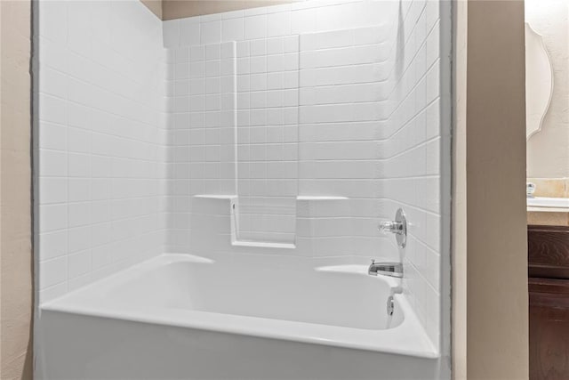 bathroom with shower / tub combination