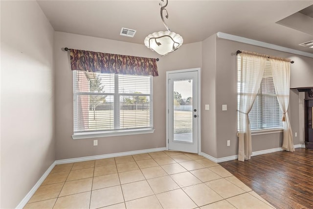 doorway with light hardwood / wood-style flooring