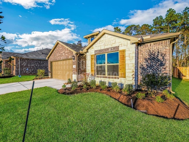 view of front of property featuring a garage and a front lawn