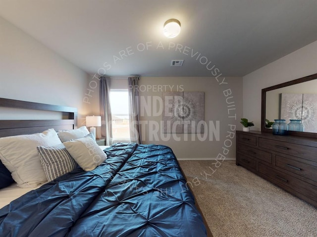 bedroom with carpet and vaulted ceiling