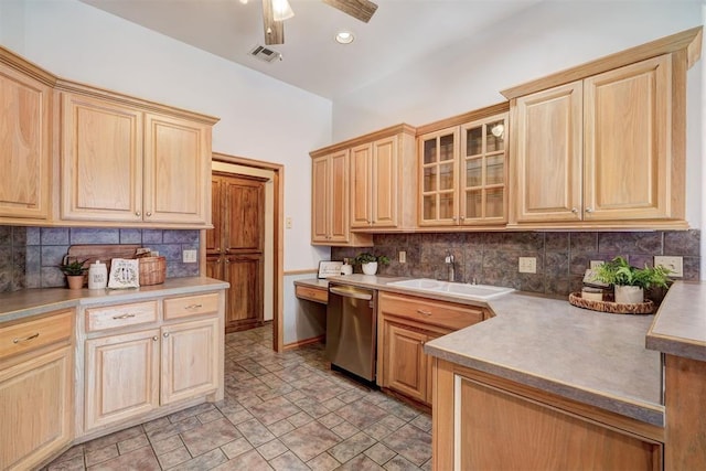 kitchen featuring light brown cabinetry, sink, stainless steel dishwasher, and ceiling fan