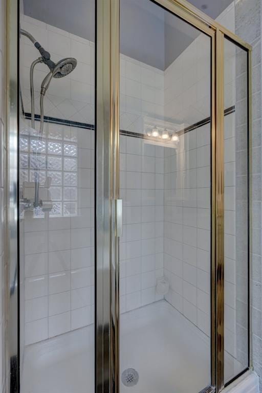 bathroom featuring walk in shower