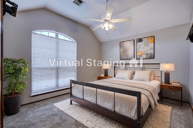 bedroom featuring ceiling fan, multiple windows, lofted ceiling, and carpet flooring