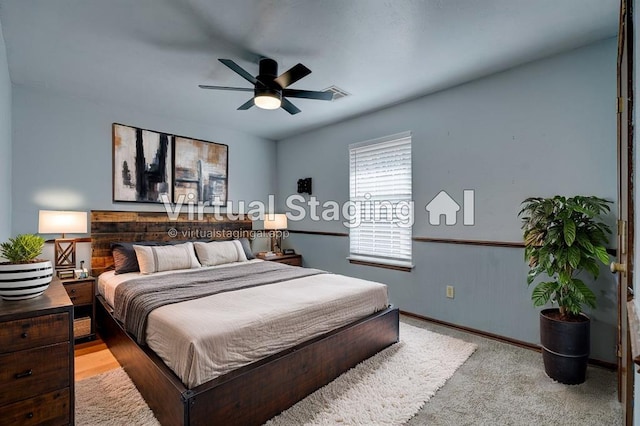 carpeted bedroom with ceiling fan