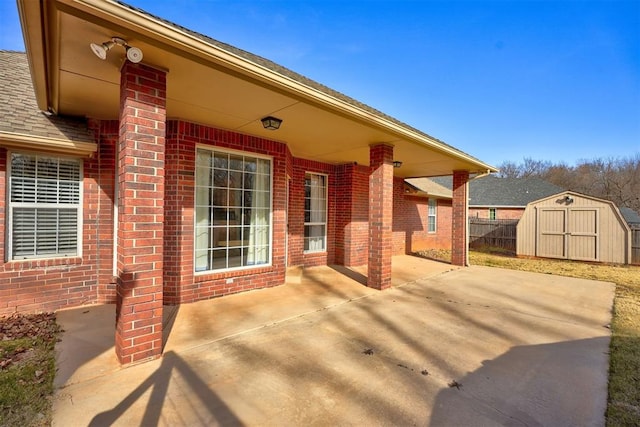 view of patio featuring a storage unit