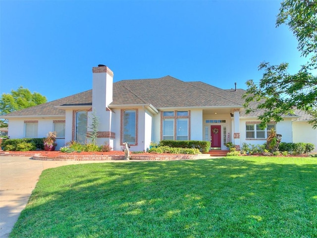 view of front of property with a front lawn