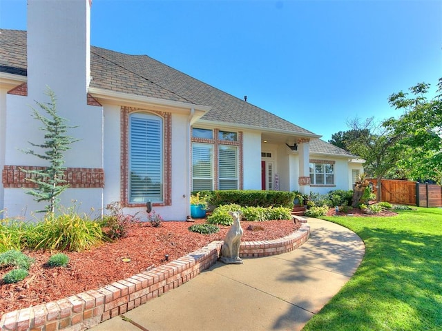 view of front of house with a front lawn