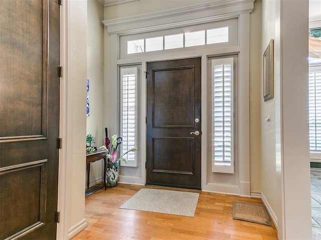 foyer with light wood-type flooring