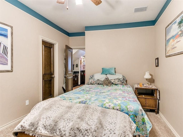 carpeted bedroom featuring ceiling fan