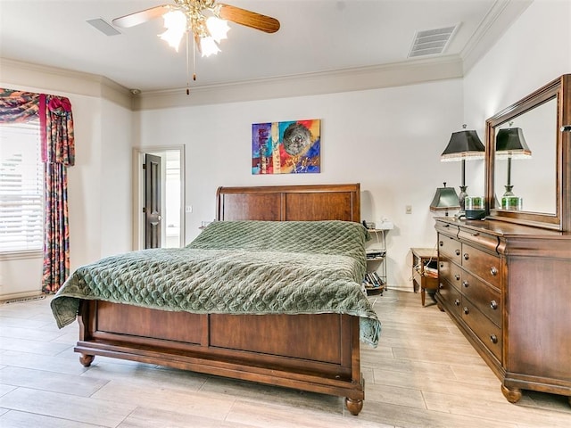 bedroom with ceiling fan, crown molding, and light hardwood / wood-style flooring