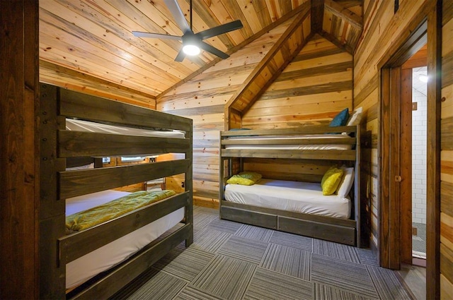 bedroom featuring wooden walls, ceiling fan, wood ceiling, and lofted ceiling