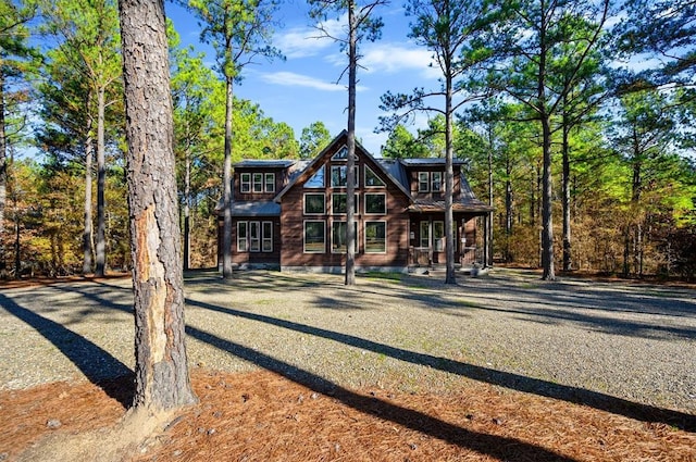 607 Sugar Pine Loop, Broken Bow, OK 74728 - rear view of house with a porch