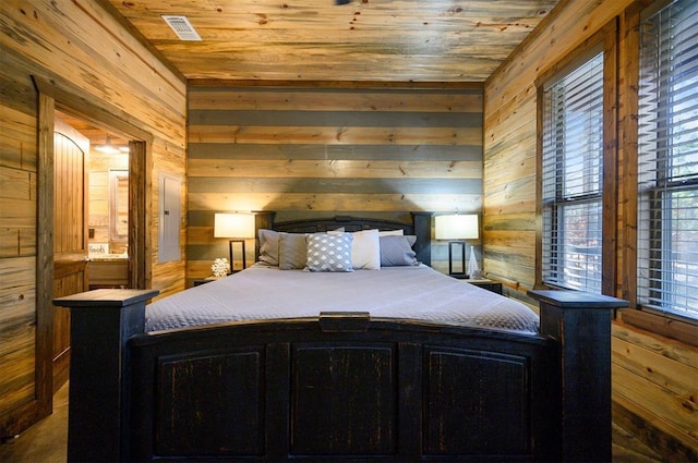607 Sugar Pine Loop, Broken Bow, OK 74728 - bedroom with wooden walls and wooden ceiling