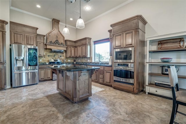 kitchen with stainless steel appliances, a kitchen breakfast bar, premium range hood, crown molding, and a kitchen island