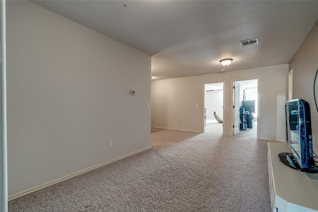 interior space featuring light colored carpet