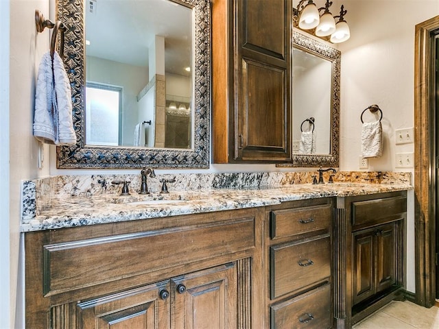 bathroom featuring vanity and tile patterned floors