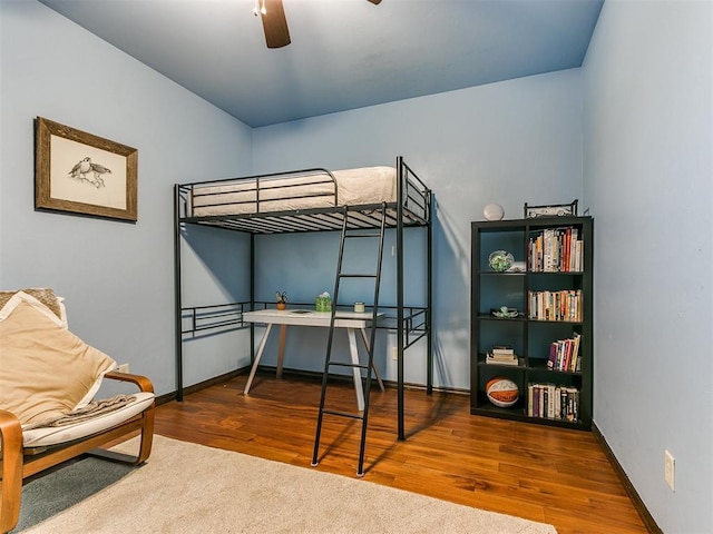 bedroom featuring wood-type flooring