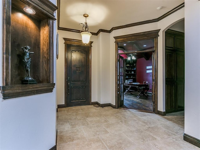 foyer entrance with ornamental molding