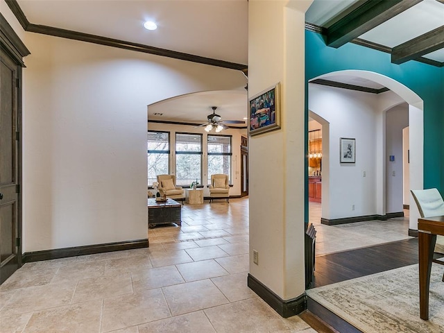 hallway with beamed ceiling and ornamental molding