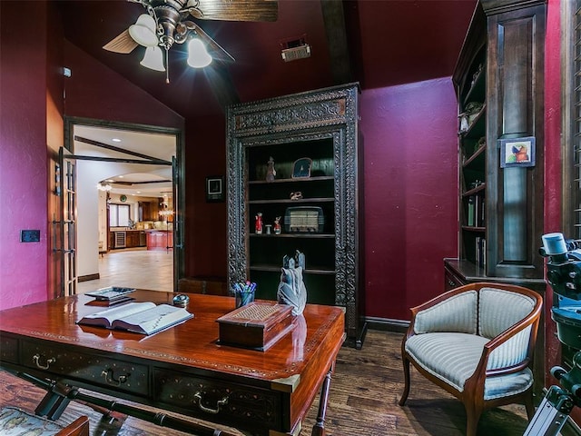 office featuring ceiling fan, built in features, and dark hardwood / wood-style flooring