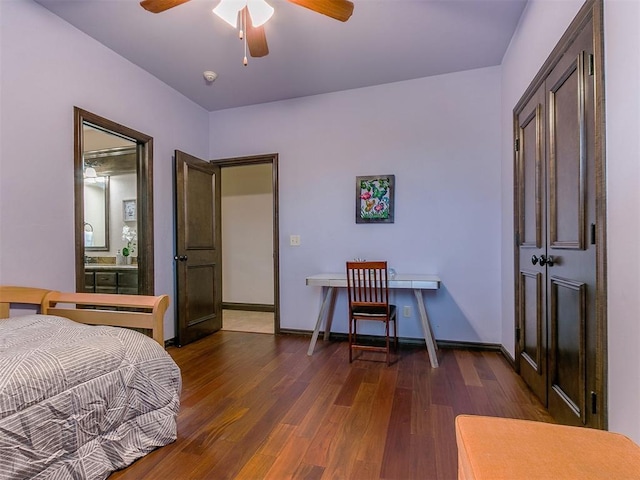 bedroom featuring dark wood-type flooring and ceiling fan