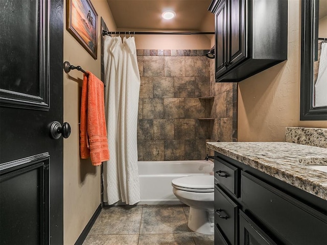 full bathroom featuring vanity, tile patterned flooring, toilet, and shower / bath combo with shower curtain