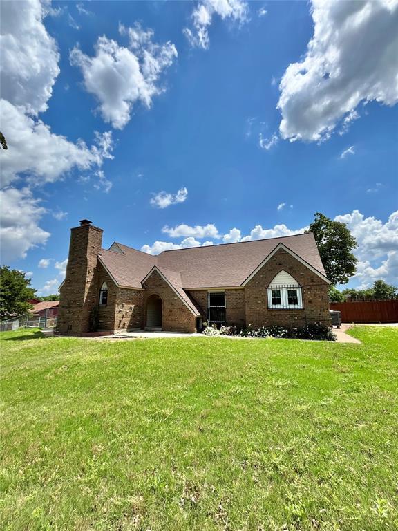 15268 Pheasant Run, Choctaw, OK 73020 - view of front of property featuring a chimney and brick siding