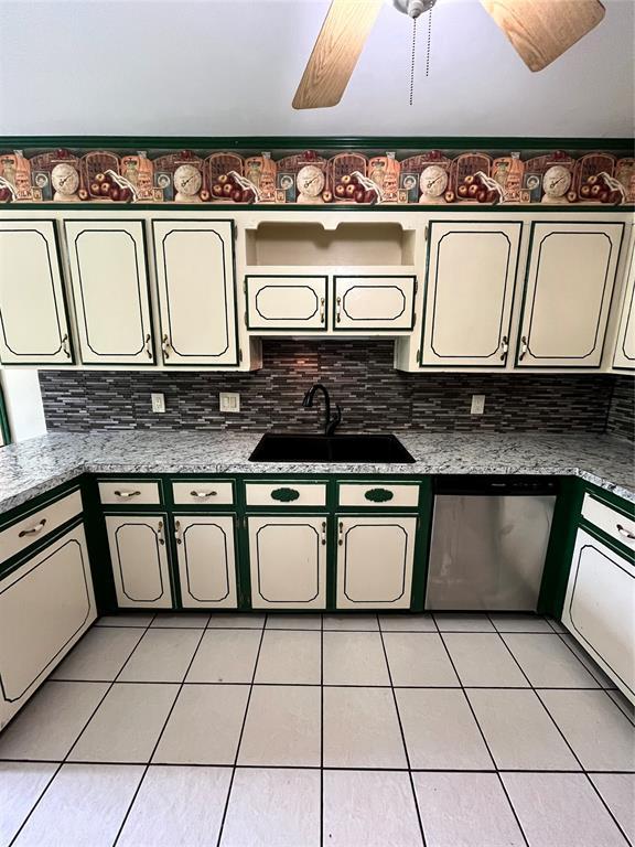 15268 Pheasant Run, Choctaw, OK 73020 - kitchen with a sink, dishwasher, light tile patterned floors, backsplash, and a ceiling fan