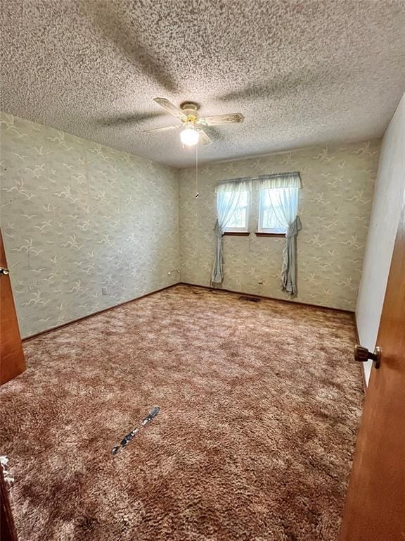 15268 Pheasant Run, Choctaw, OK 73020 - unfurnished room featuring carpet, a ceiling fan, and a textured ceiling
