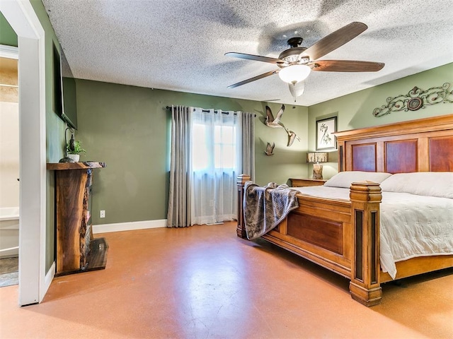 bedroom with a textured ceiling and ceiling fan