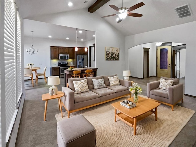 living room with beamed ceiling, ceiling fan with notable chandelier, and high vaulted ceiling