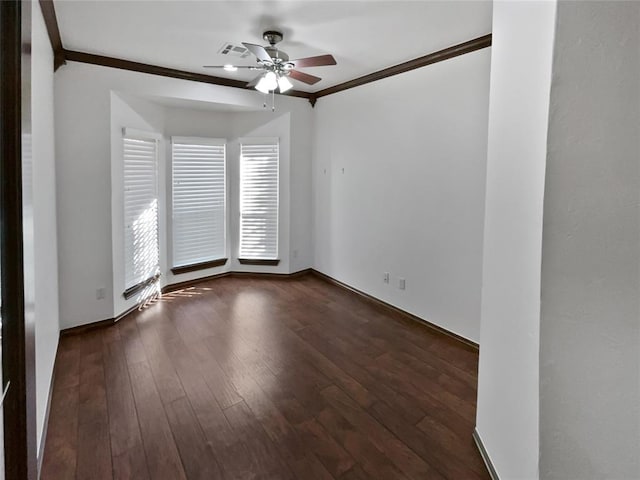 unfurnished room featuring ceiling fan, dark hardwood / wood-style flooring, and ornamental molding