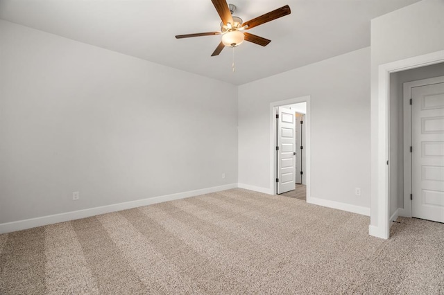 unfurnished bedroom featuring ceiling fan and light colored carpet