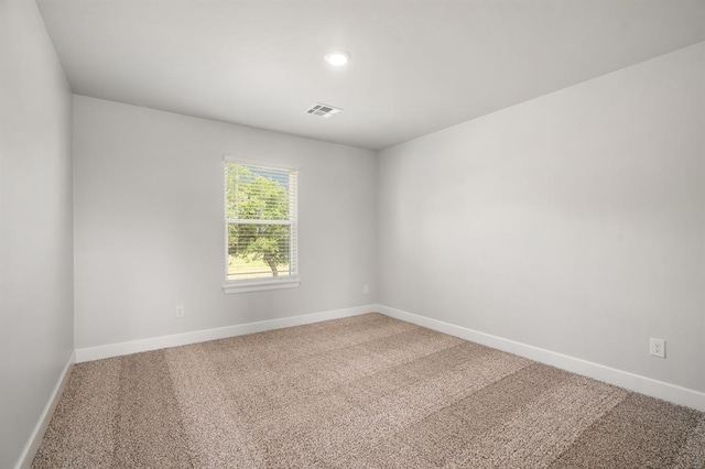 view of carpeted spare room