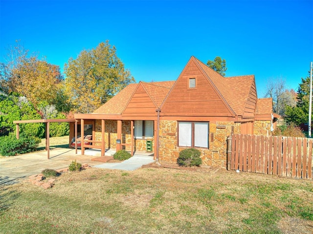 view of front of house with a porch and a front lawn