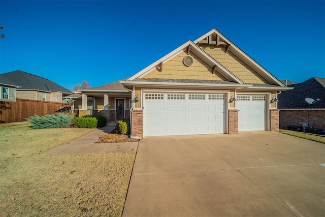 craftsman-style home with a garage