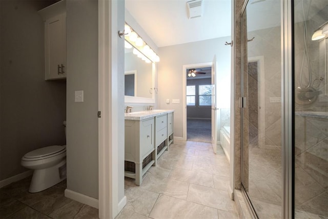 full bathroom featuring french doors, vanity, ceiling fan, independent shower and bath, and toilet