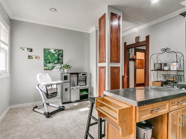 interior space featuring a breakfast bar area, crown molding, a kitchen island, and light tile patterned floors