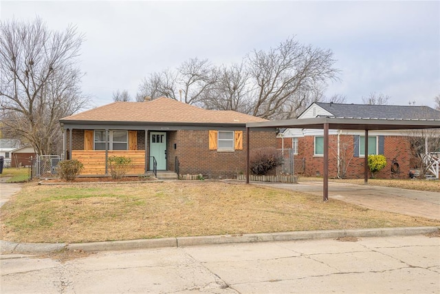 single story home featuring a front yard