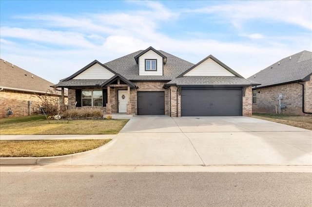 view of front facade with a front lawn and a garage