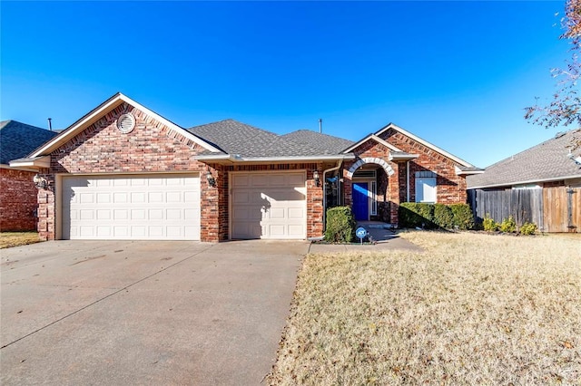 ranch-style house featuring a garage