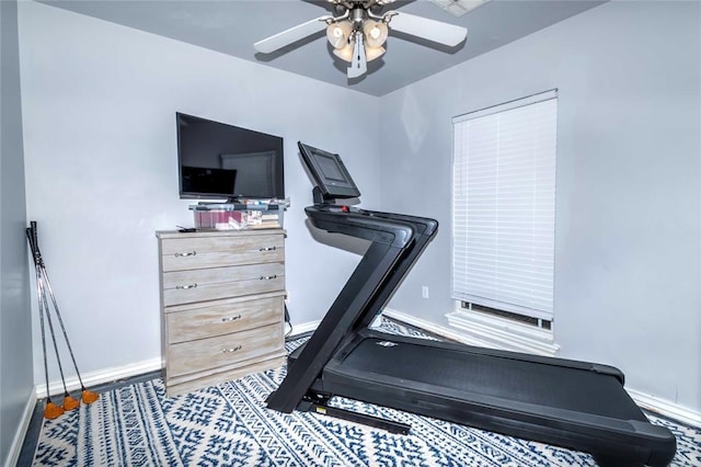 workout room featuring ceiling fan